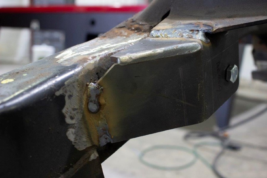 Rust Buster Front Upper Trailing Arm Mount, Left - TJ