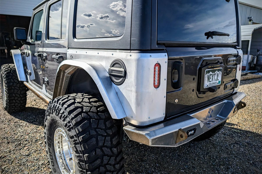 Next Venture Motorsports Rear Steel Corner Armor w/ 6in Oval LED & Factory Fuel Door Cutouts - JL 4DR