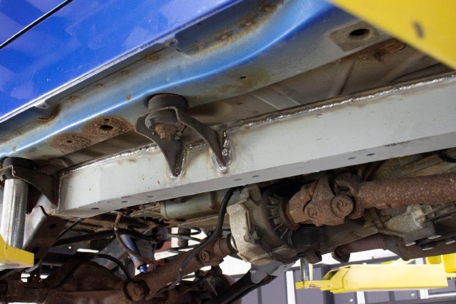 Rust Buster Center Frame at Skid Plate Mount, Left - TJ 2003-06