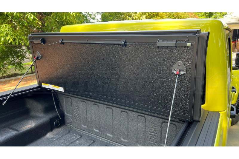 Rugged Ridge Armis Hard Folding Tonneau Bed Cover w/ LINE-X ( Part Number: RGR13550.24) Rugged Ridge Armis Hard Folding Tonneau Bed Cover w/ LINE-X ( Part Number: 13550.24)