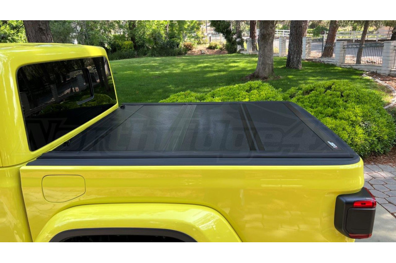 Rugged Ridge Armis Hard Folding Tonneau Bed Cover w/ LINE-X ( Part Number: RGR13550.24) Rugged Ridge Armis Hard Folding Tonneau Bed Cover w/ LINE-X ( Part Number: 13550.24)