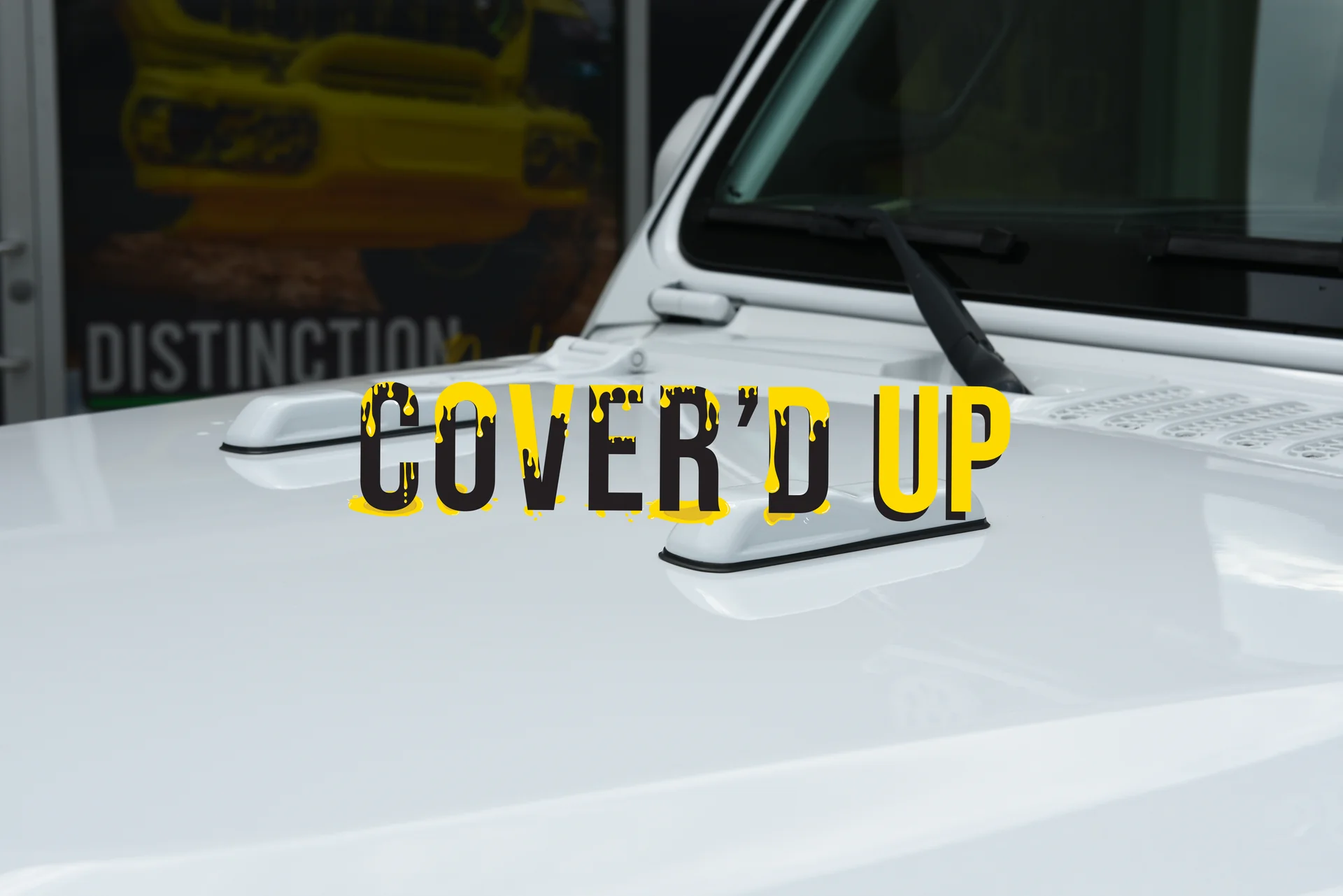 Distinction Applied Covered up brand logo